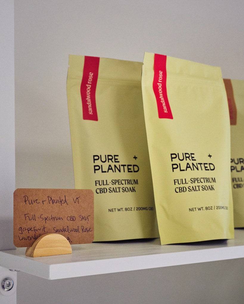 small bags of Pure + Planted bath soak CBD products on store shelf