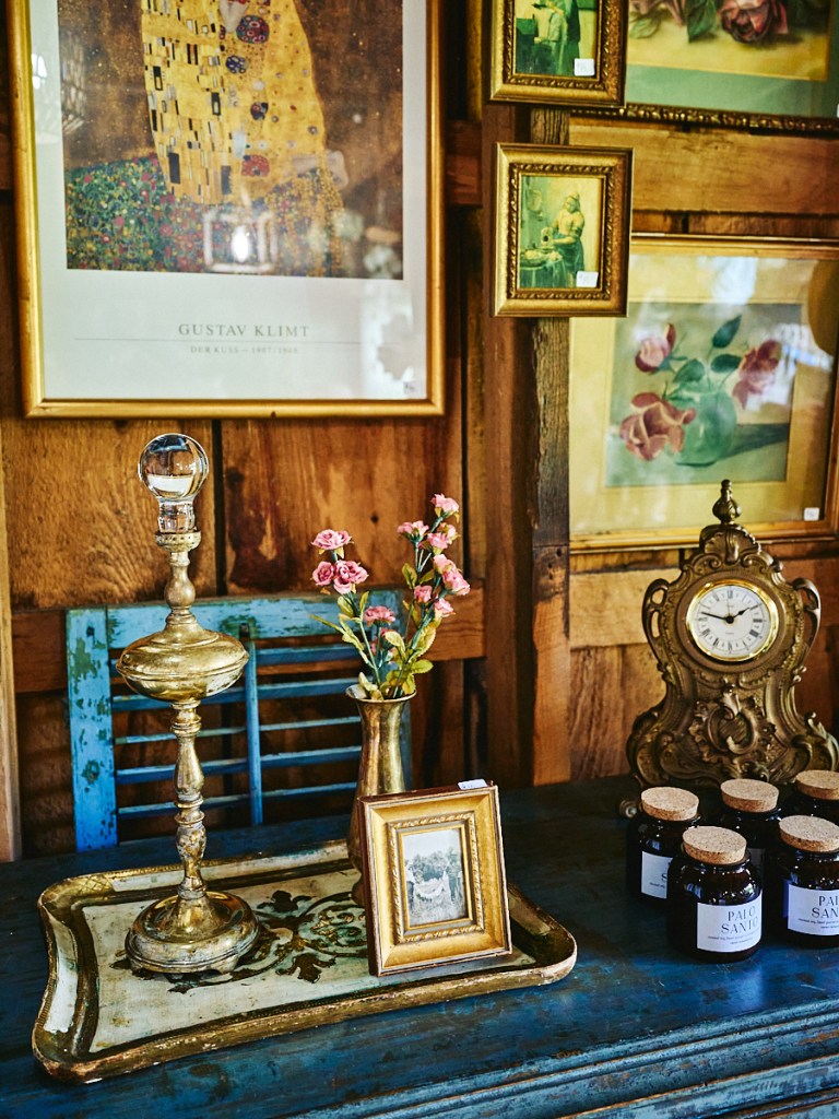 vintage furniture, clothing and items inside historic barn in Vermont